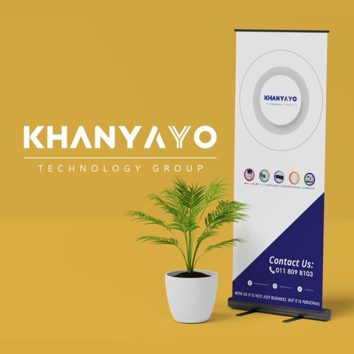 Khanyayo Pull-up Banner next to a pot of flowers with logo on the side