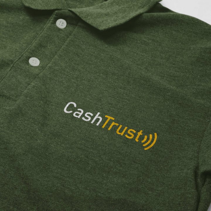 Cashtrust Logo on a Green Polo/golf T-shirt pocket sleeve